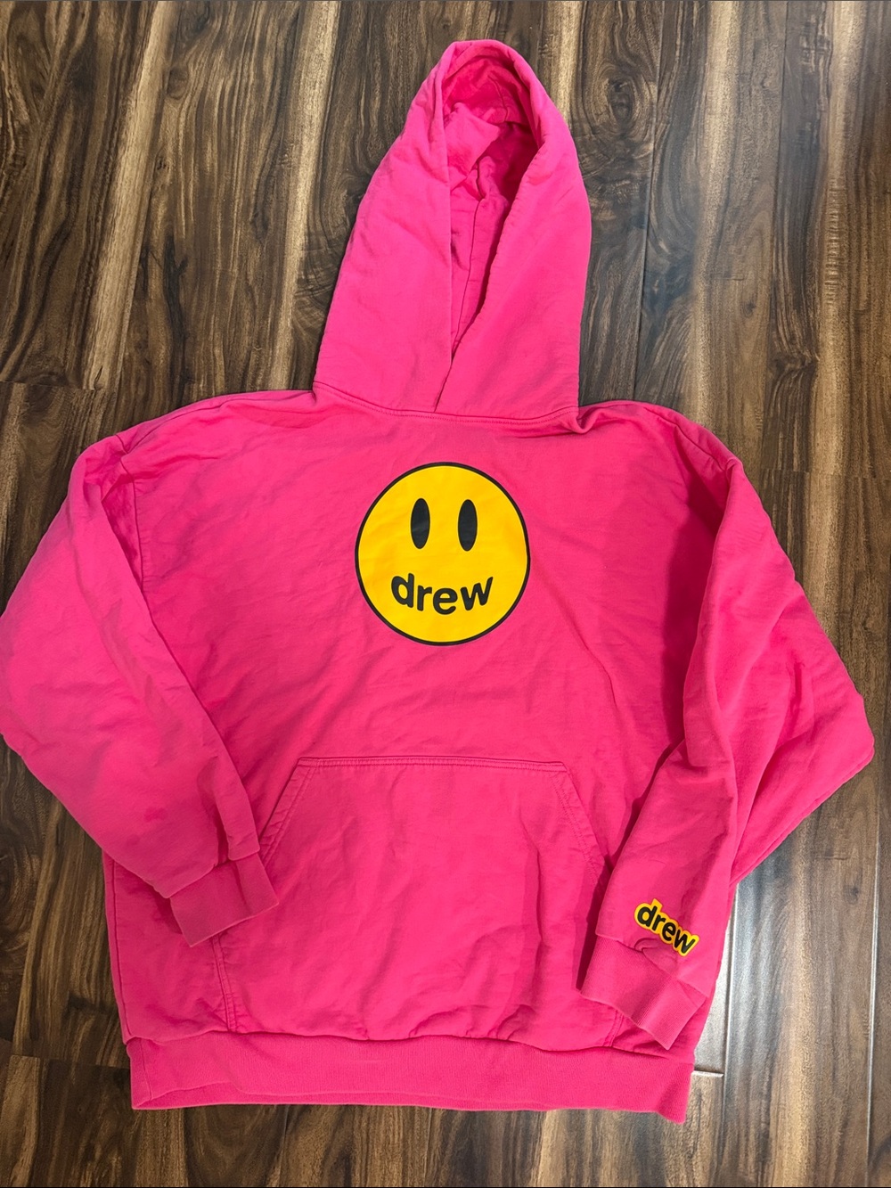 drew house hot pink hoodie with yellow smiley logo